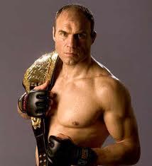  Autors: NEOVO Randy Couture