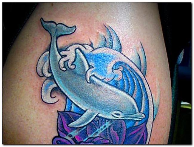Delfins simbolizē gudrību... Autors: Sadwolf Dzīvnieku tetovējumu nozīme 2.