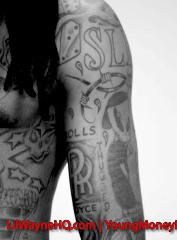 A more detailed view of Weezys... Autors: Chiko1 Lil Wayne Tattoo Nozīmes ( ENG)