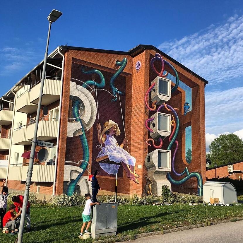 Autors: Zibenzellis69 Šis mākslinieks izveido satriecošus 3D  gleznojumus uz ēku sienām